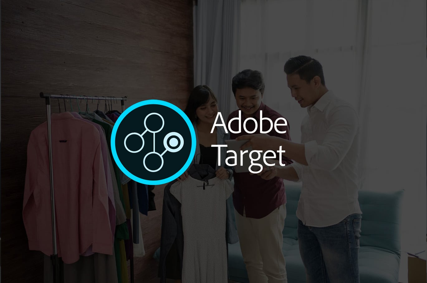 adobe target logo over background image of people discussing on tablet