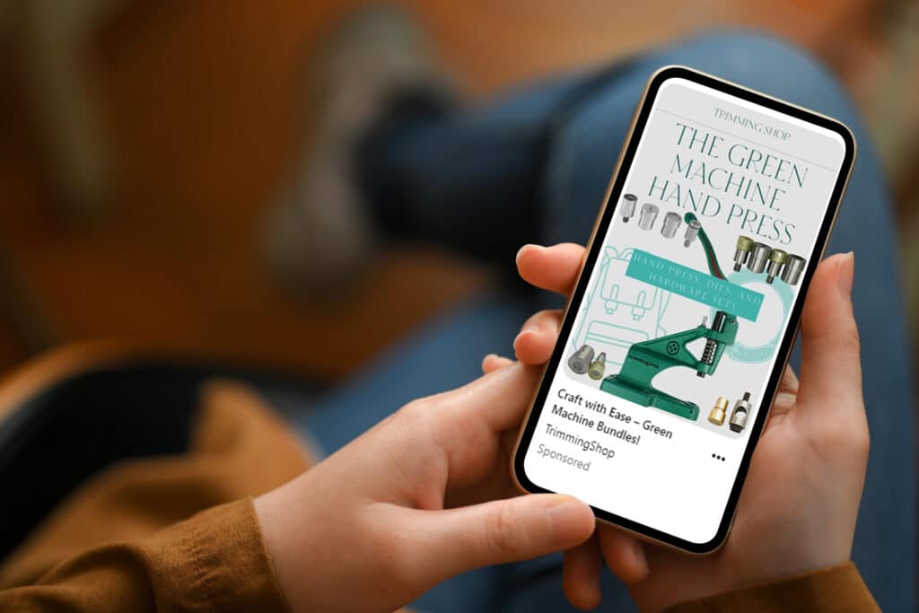 person looking at Trimming Shop Green Machine Hand Press Pinterest Ad on mobile