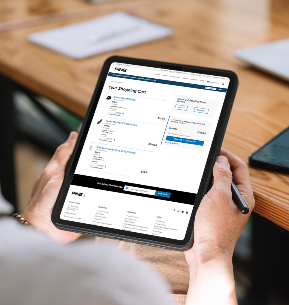 person using tablet for buying products from Ping website